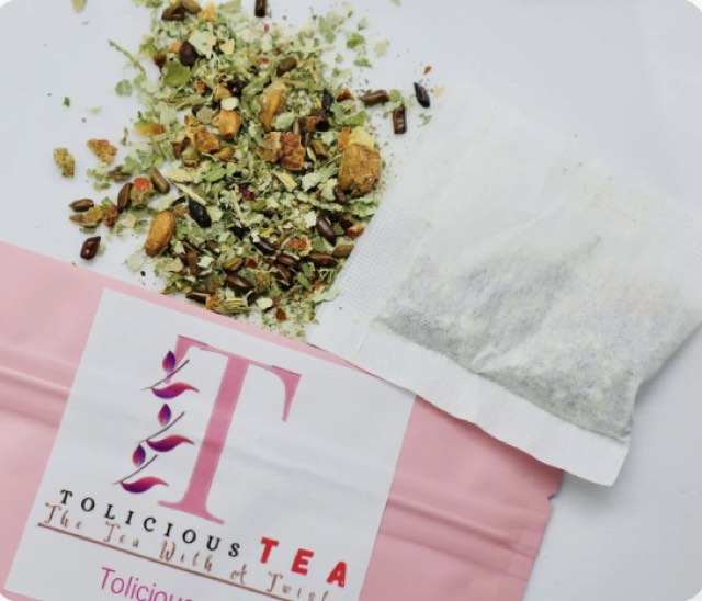 The natural loose-leaf Body Goal Tea blend and tea bag